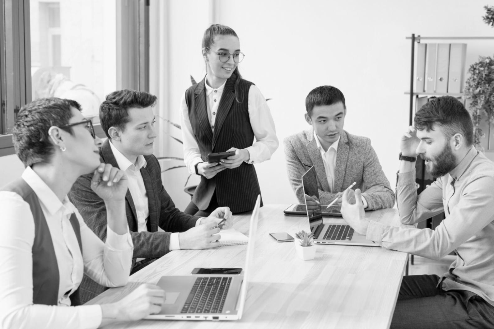 Advanced trading analysis workspace with multiple monitors displaying market data and technical charts
