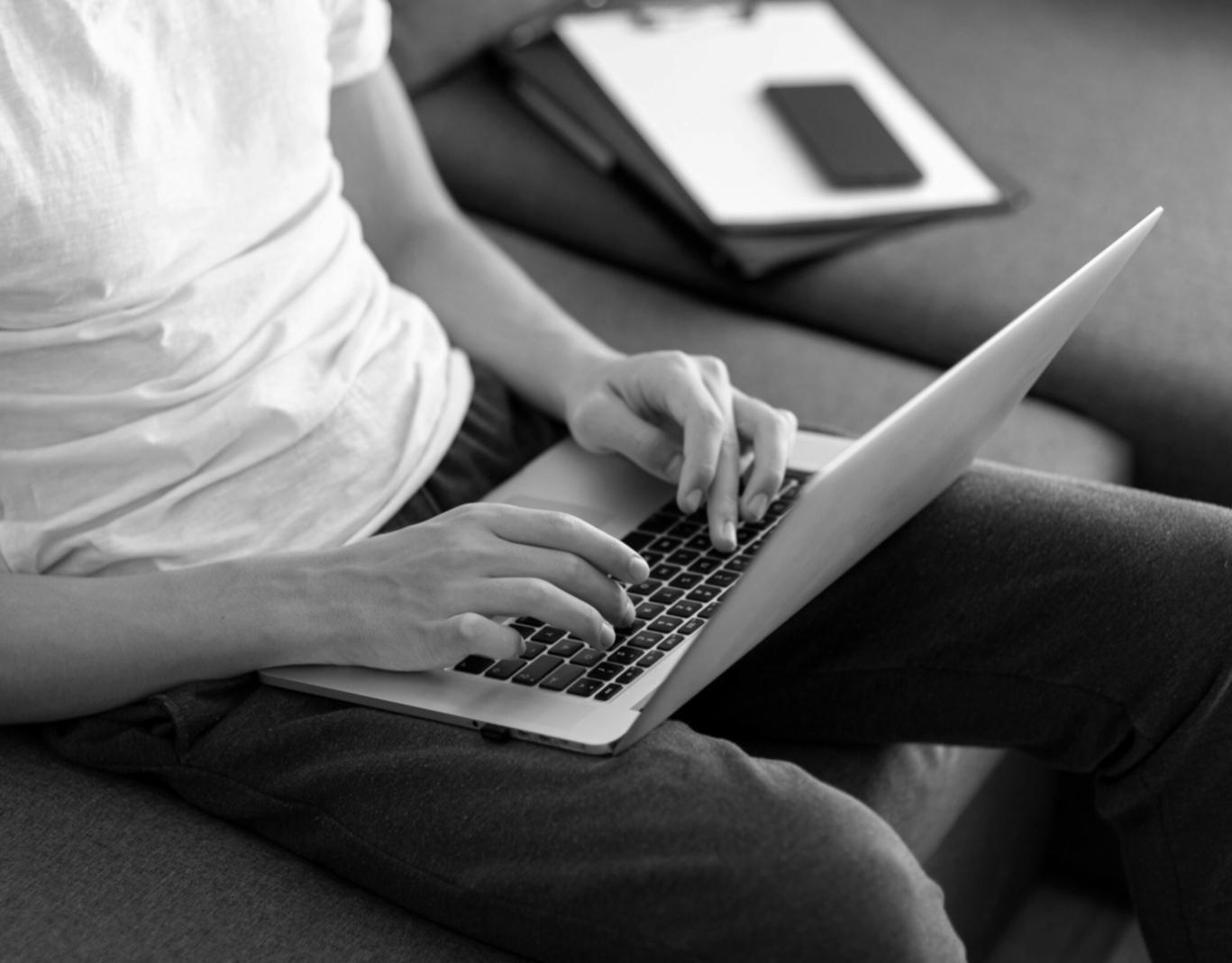 Students collaborating on trading strategy analysis in modern learning environment