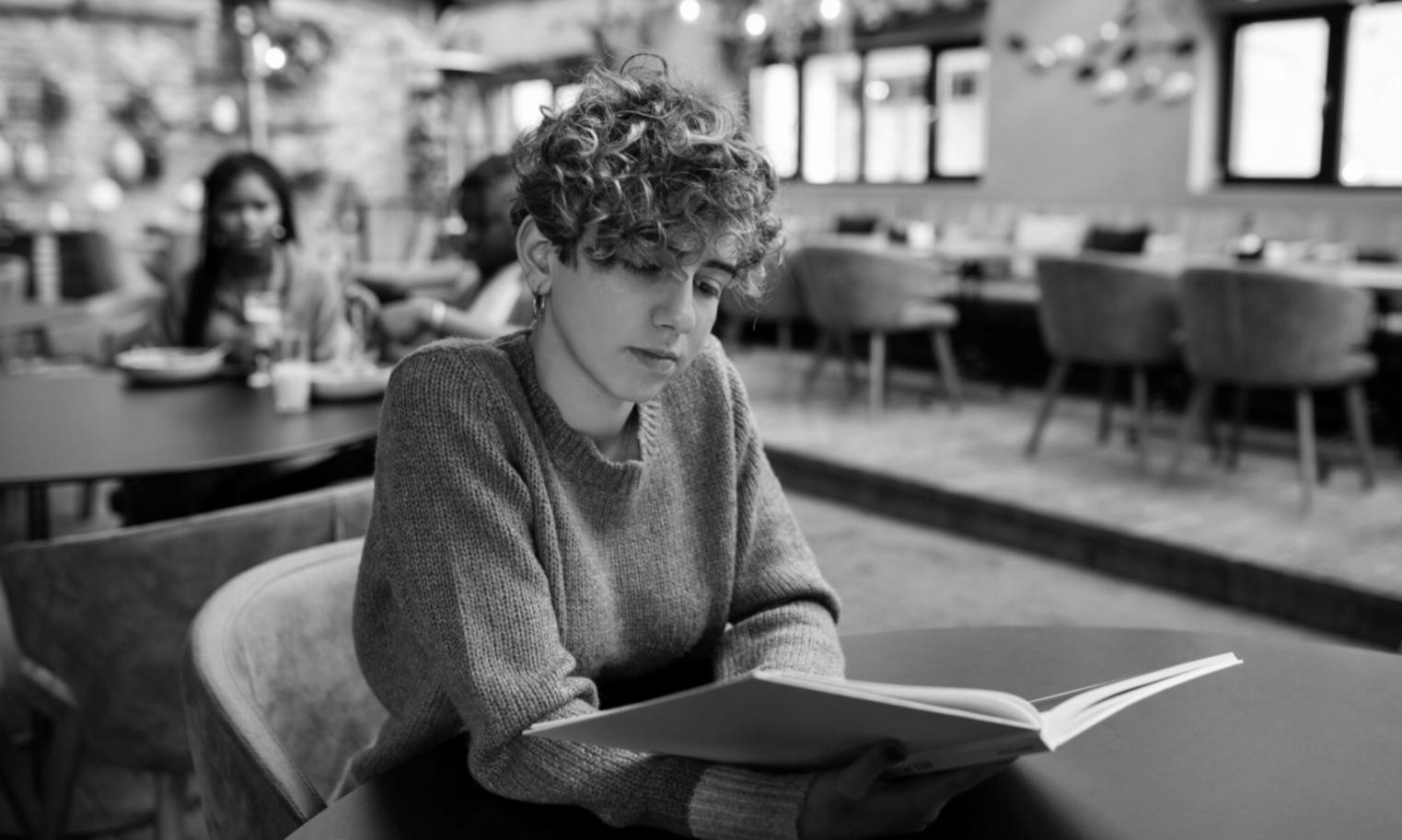 Financial market data analysis on multiple computer screens showing various trading indicators and charts