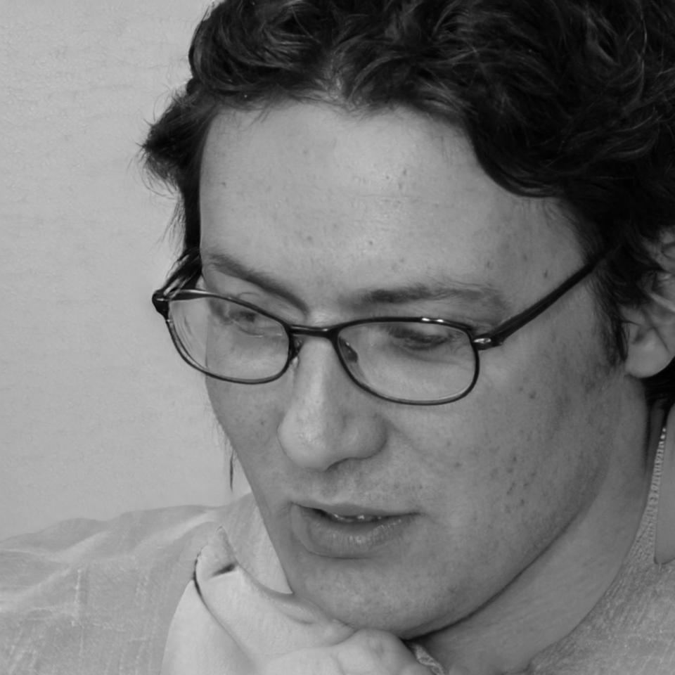 Portrait of Dmytro Kozlov, derivatives trading expert